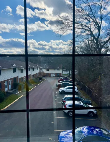 a view of swimming pool from a balcony