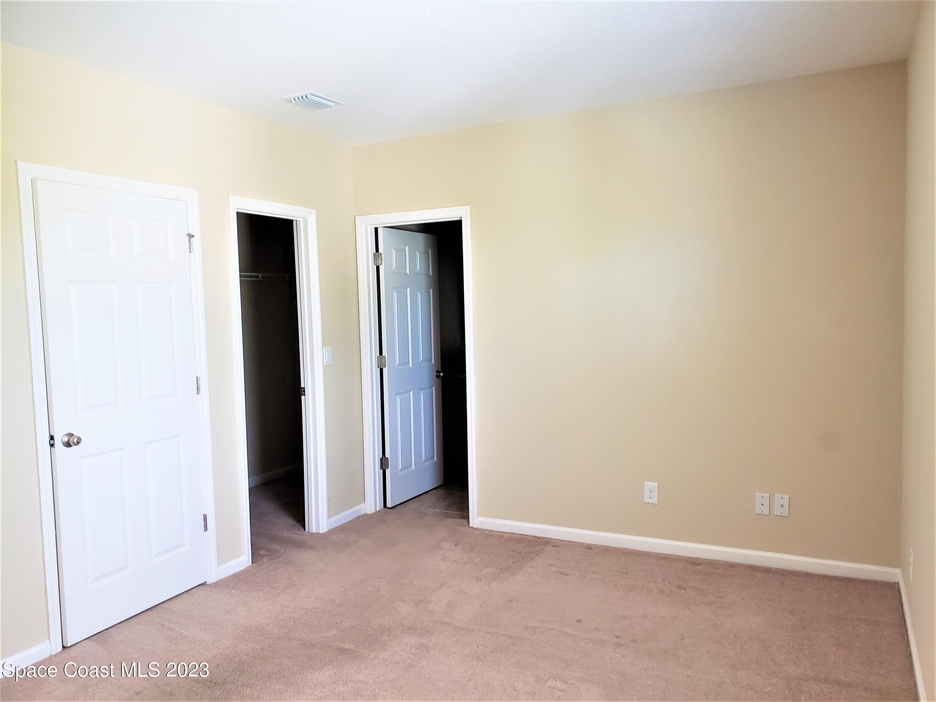 2575 Revolution Street, Unit 105 Melbourne, FL 32935 - Photo 17 of 38 a view of an empty room