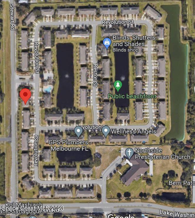 2575 Revolution Street, Unit 105 Melbourne, FL 32935 - Photo 35 of 38 a front view of a building with an outdoor space