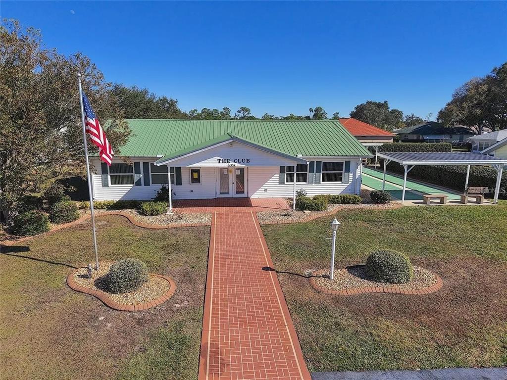 1629 Willow Run Sebring, FL 33872 - Photo 14 of 16 a view of a house with a backyard