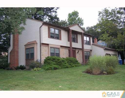 48 Pinecrest Road Somerset, NJ 08873 - Photo 2 of 10 a view of a house with a garden and plants
