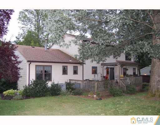 48 Pinecrest Road Somerset, NJ 08873 - Photo 10 of 10 a front view of a house with a yard