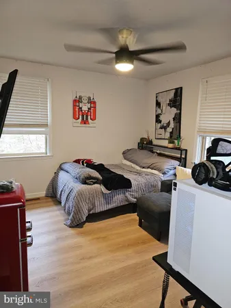 a bedroom with furniture and a bed