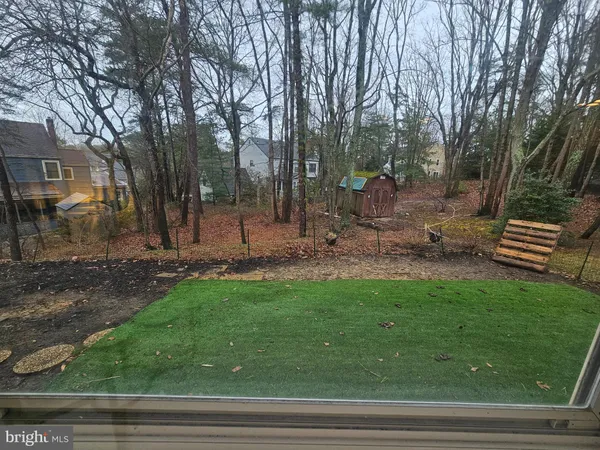 a view of a backyard with green space