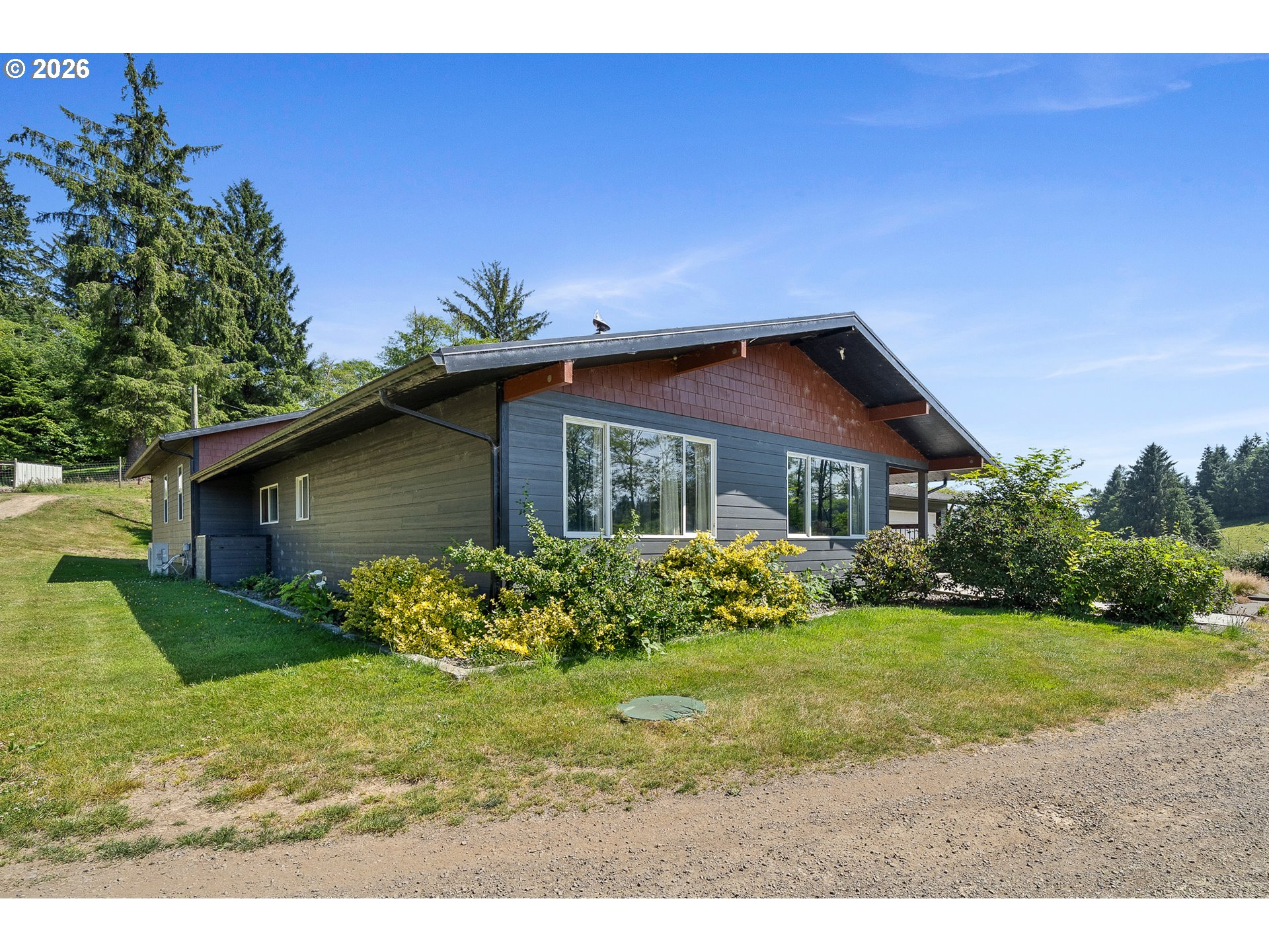 850 Hodgdon Road Tillamook, OR 97141 - Photo 34 of 43 a view of a house with a yard