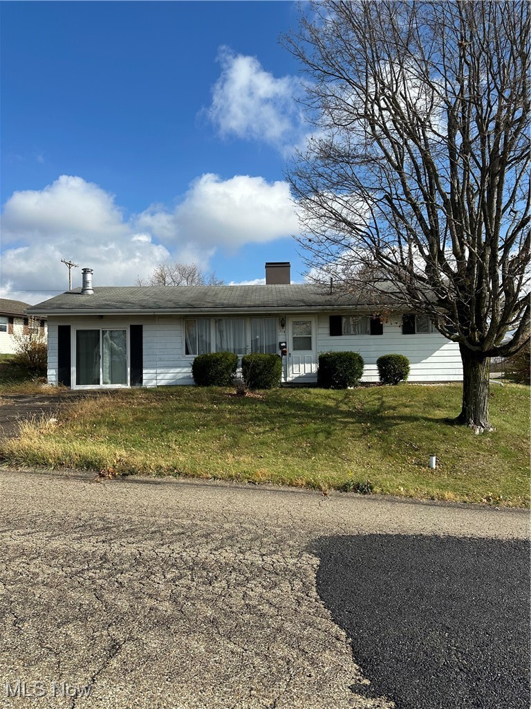314 Devon Road Woodsfield, OH 43793 - Photo 1 of 50 Ranch-style house featuring a front lawn with two entries ( Sliding glass door and front door) and off street parking in drive way