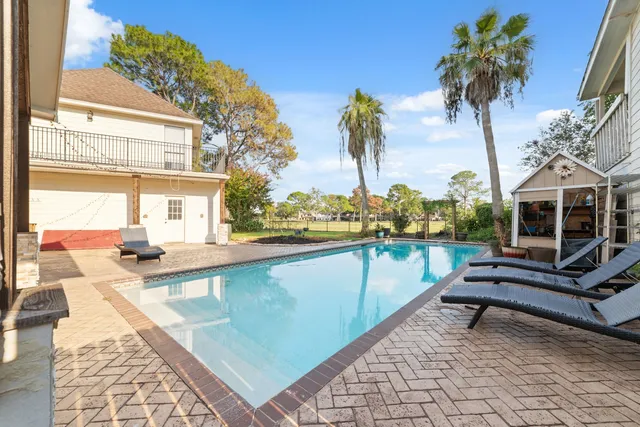 a house view with a sitting space and a lounge chair