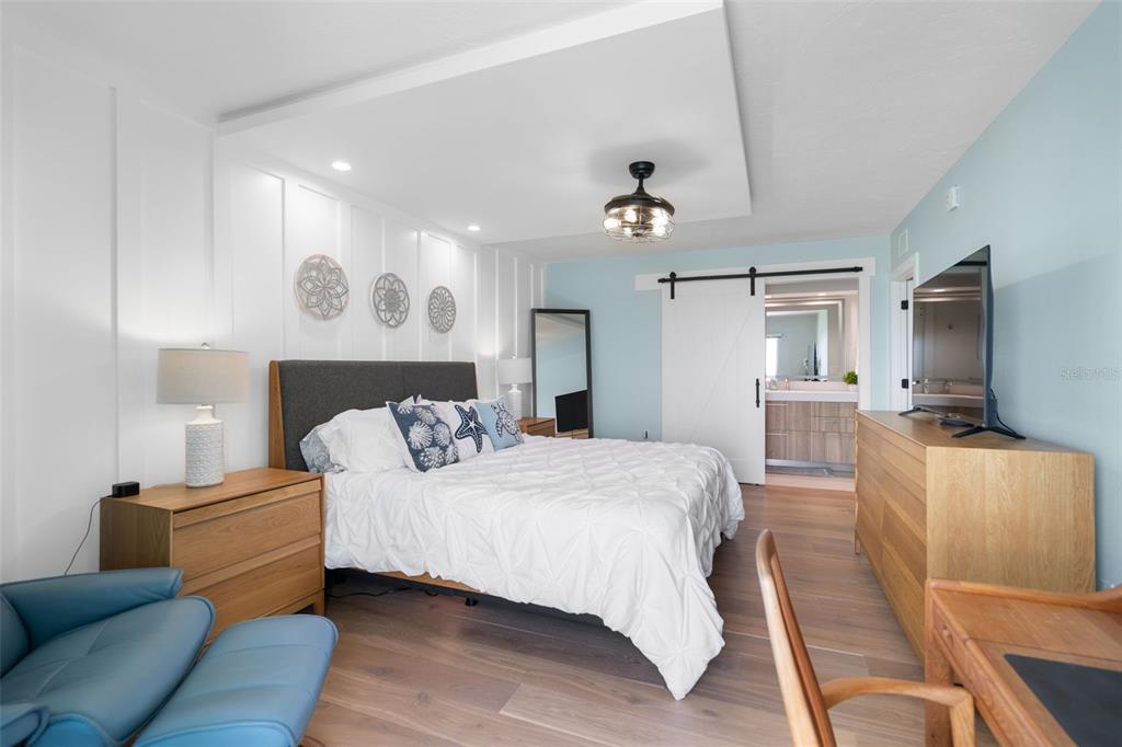 1050 Longboat Club Road, Unit 901 Longboat Key, FL 34228 - Photo 15 of 37 a bedroom with a bed and furniture