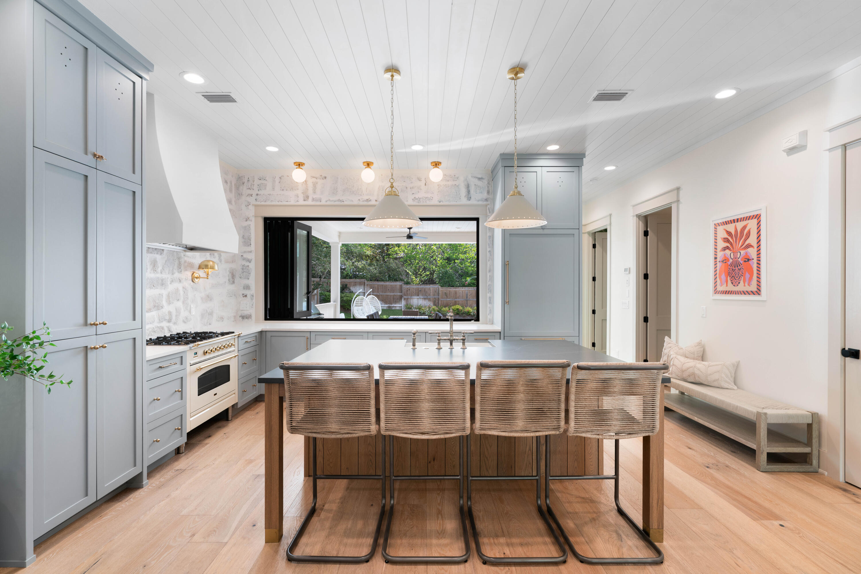 275 Clareon Dr Inlet Beach Inlet Beach, FL 32461 - Photo 12 of 76 a kitchen with stainless steel appliances granite countertop a stove a sink and a refrigerator