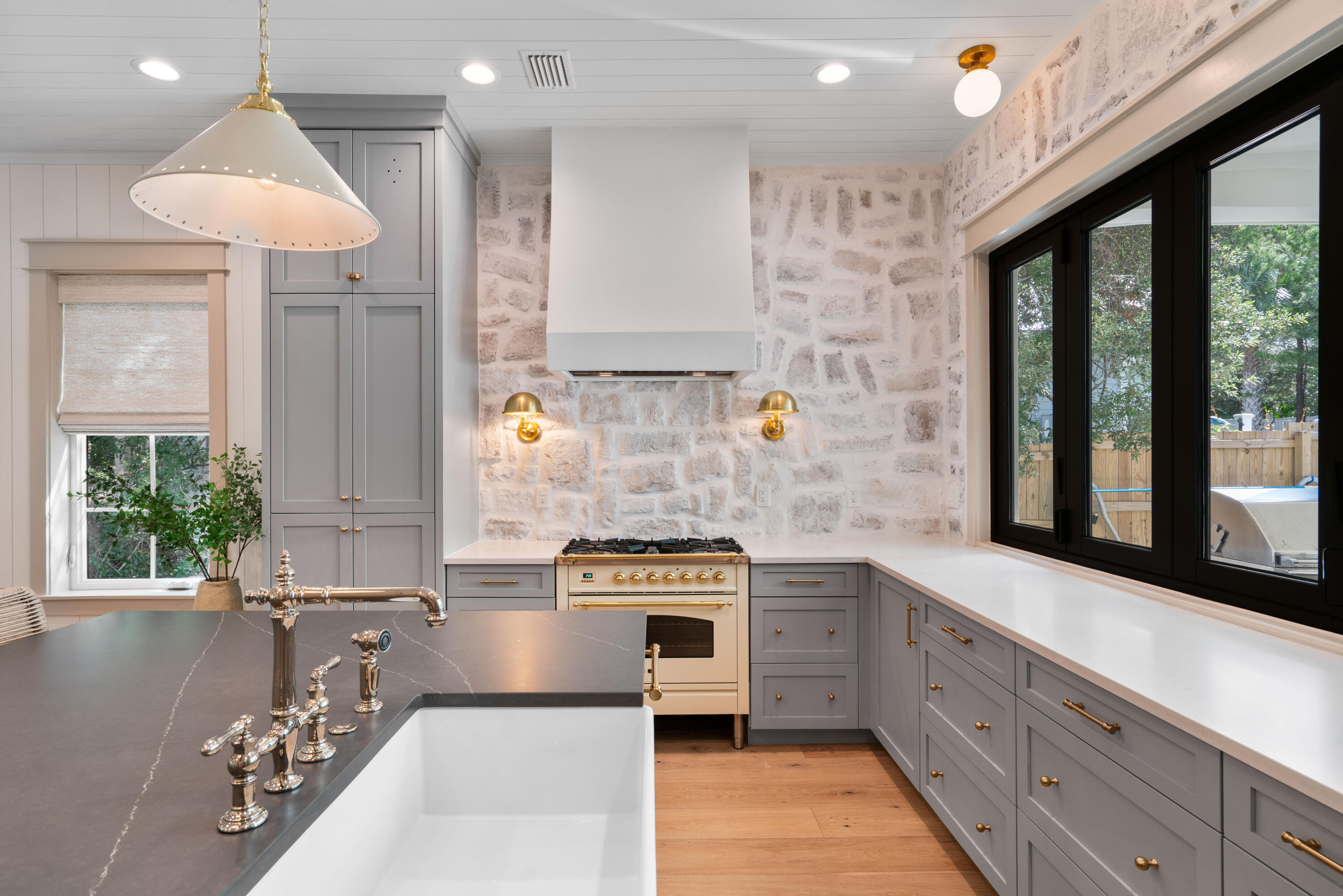 275 Clareon Dr Inlet Beach Inlet Beach, FL 32461 - Photo 16 of 76 a kitchen with stainless steel appliances granite countertop a stove a sink and a refrigerator