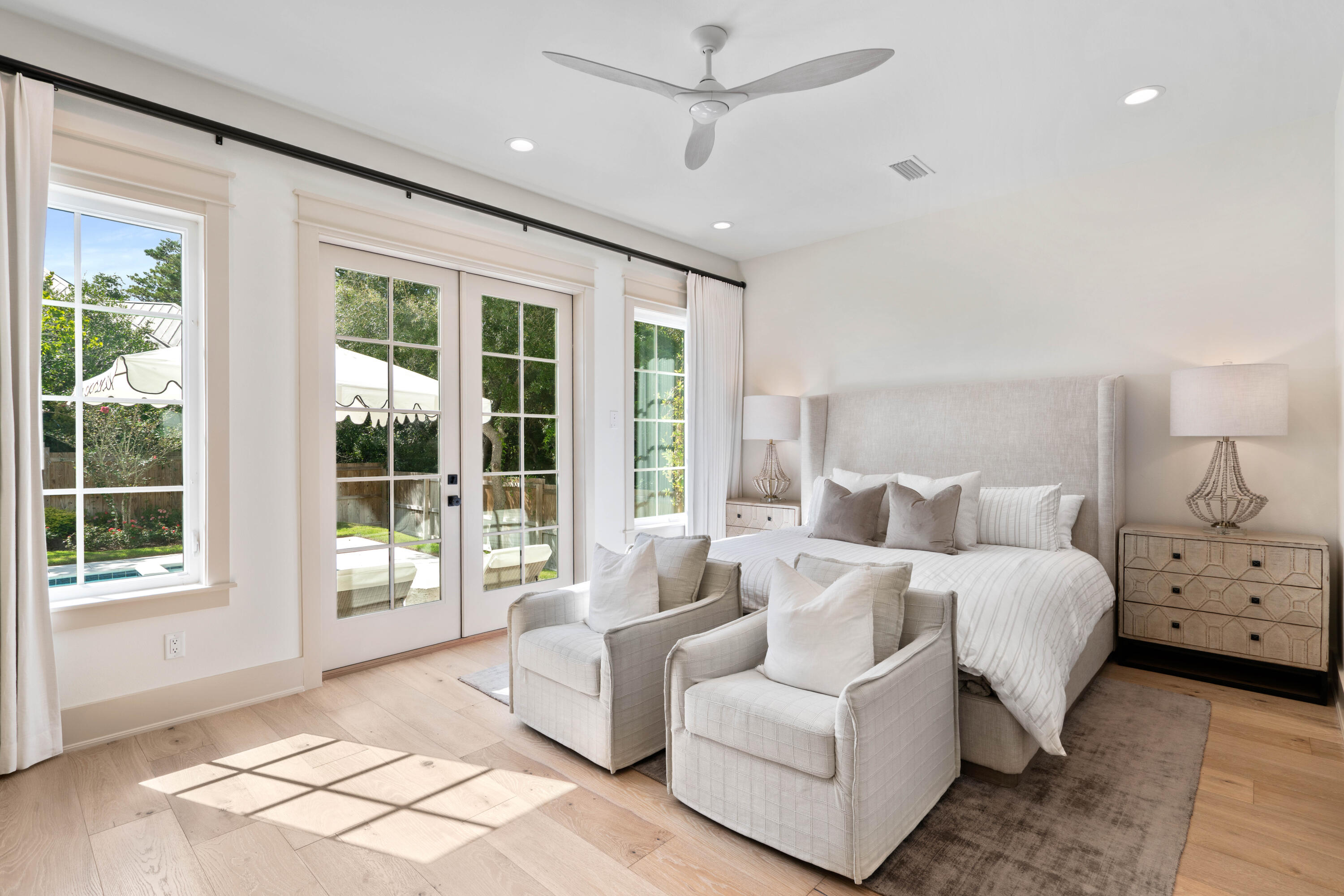 275 Clareon Dr Inlet Beach Inlet Beach, FL 32461 - Photo 23 of 76 a spacious bedroom with a bed and glass window