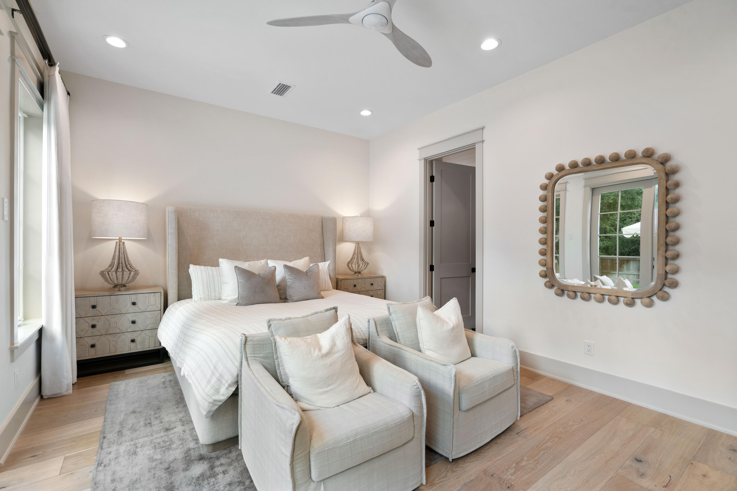 275 Clareon Dr Inlet Beach Inlet Beach, FL 32461 - Photo 25 of 76 a bedroom with a bed and a chandelier