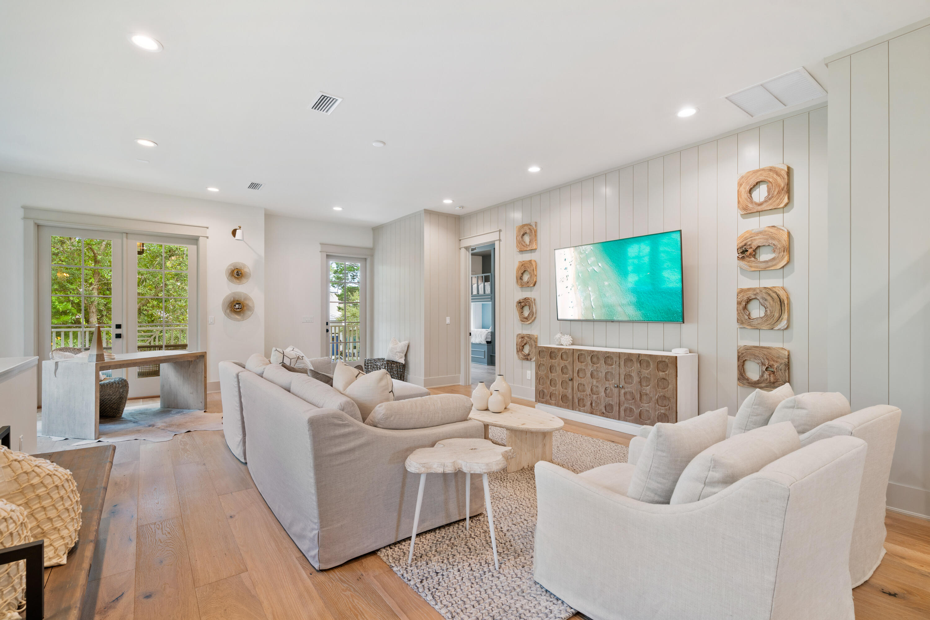 275 Clareon Dr Inlet Beach Inlet Beach, FL 32461 - Photo 32 of 76 a living room with furniture and a large window