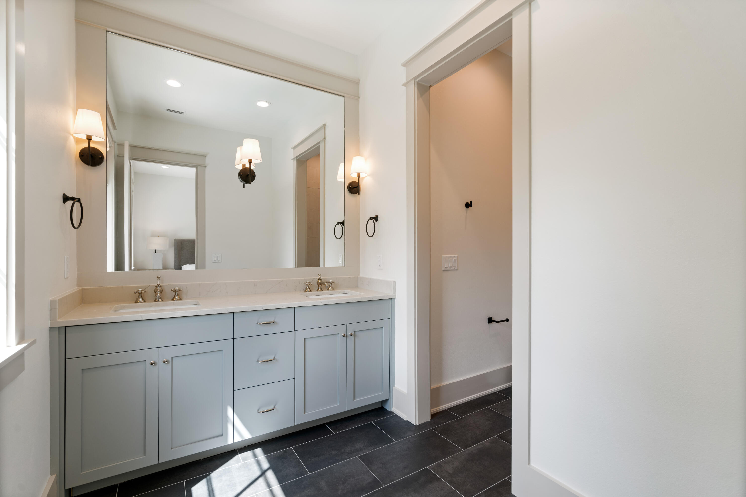 275 Clareon Dr Inlet Beach Inlet Beach, FL 32461 - Photo 46 of 76 a spacious bathroom with a double vanity sink a mirror and a shower