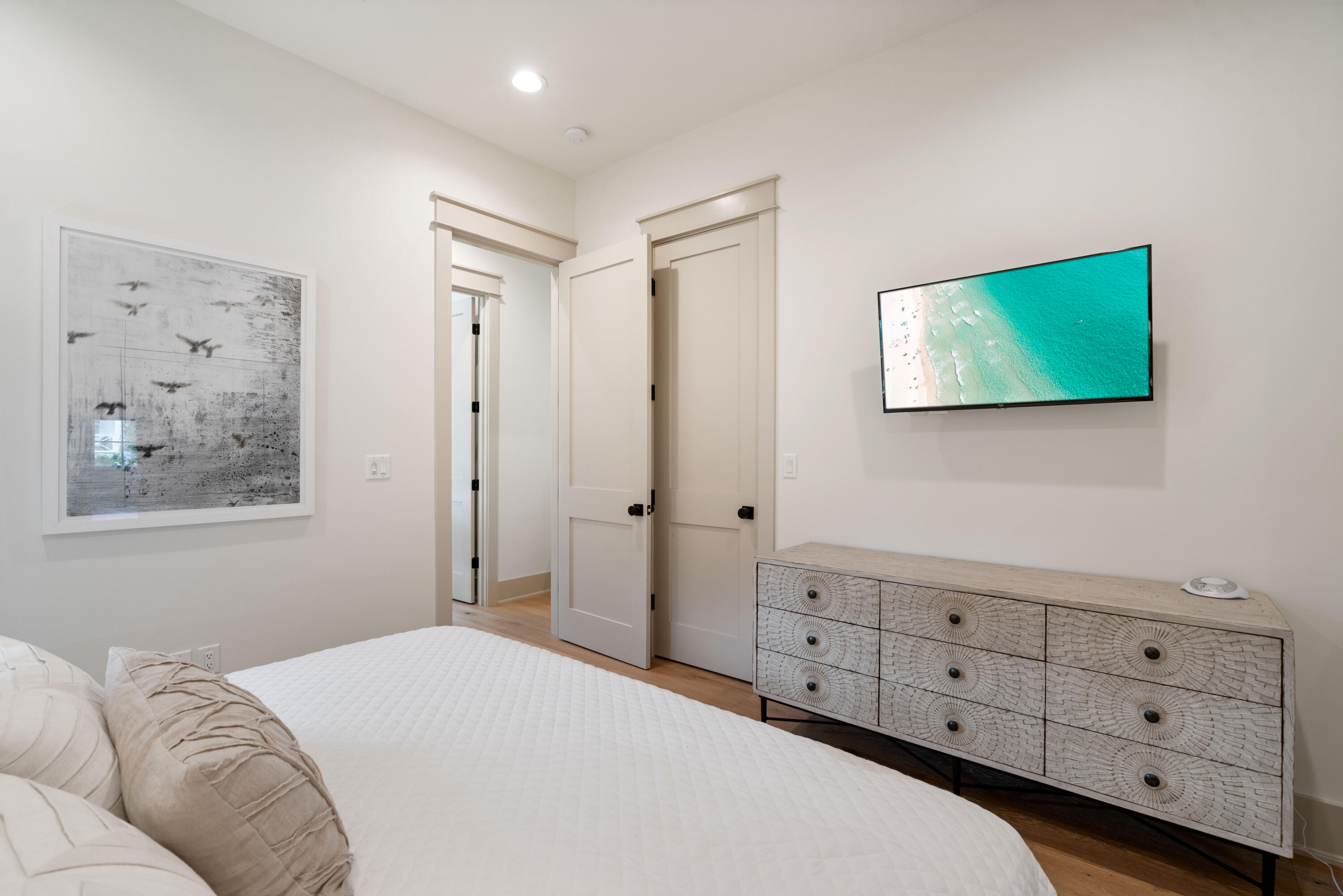 275 Clareon Dr Inlet Beach Inlet Beach, FL 32461 - Photo 50 of 76 a bedroom with a bed and a cabinet