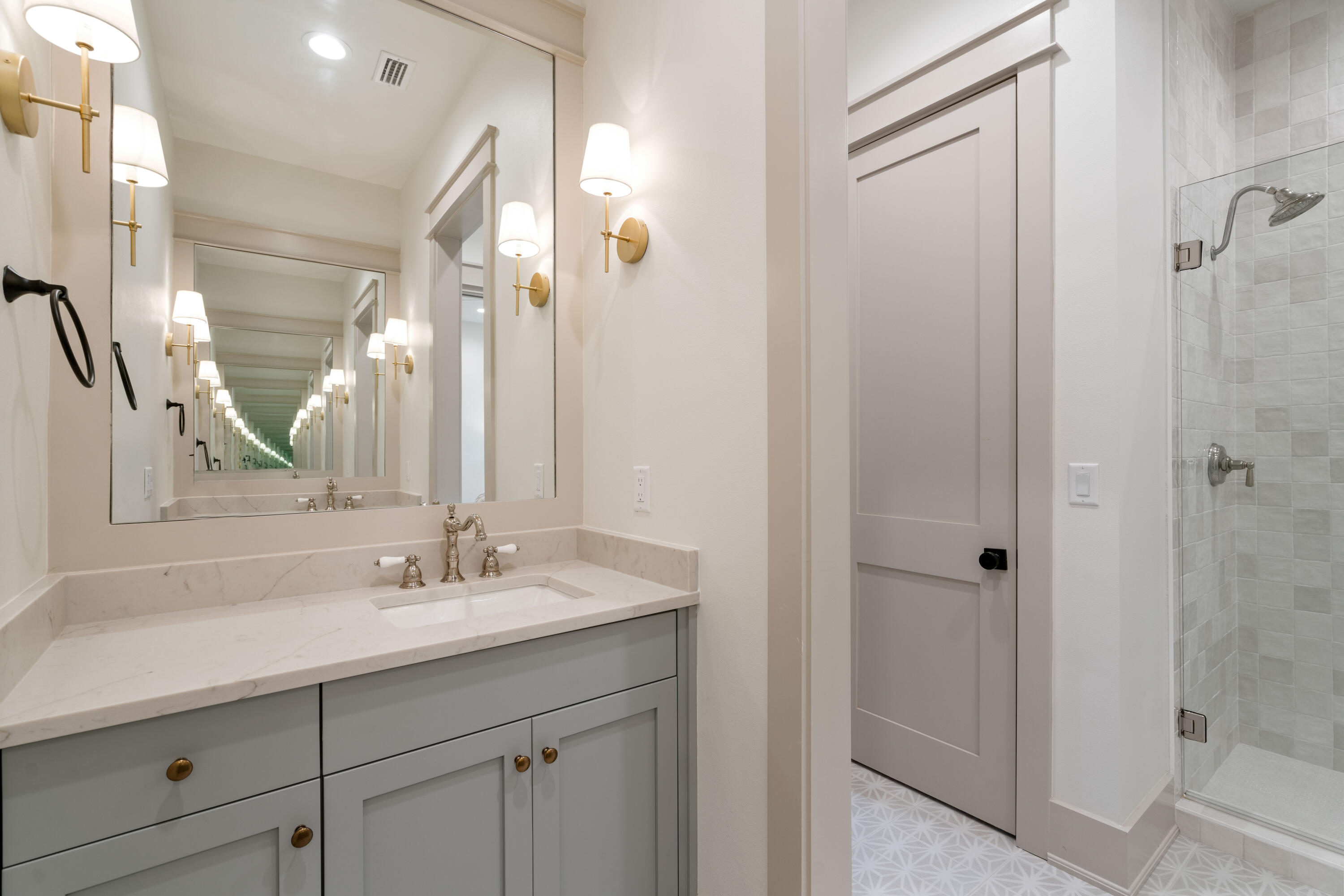 275 Clareon Dr Inlet Beach Inlet Beach, FL 32461 - Photo 54 of 76 a bathroom with a double vanity sink mirror and shower