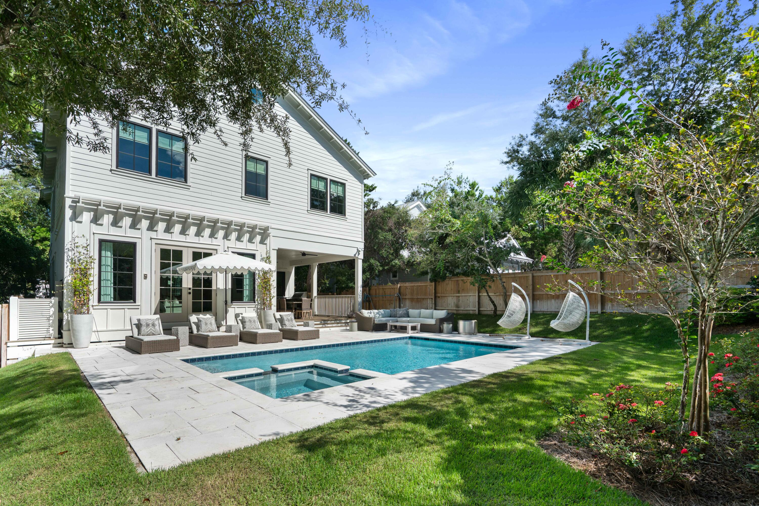 275 Clareon Dr Inlet Beach Inlet Beach, FL 32461 - Photo 66 of 76 a view of a house with backyard porch and sitting area