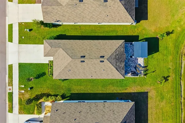 a room with gym equipment and windows
