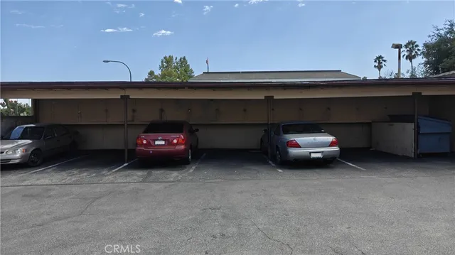 front view of a house with a tree