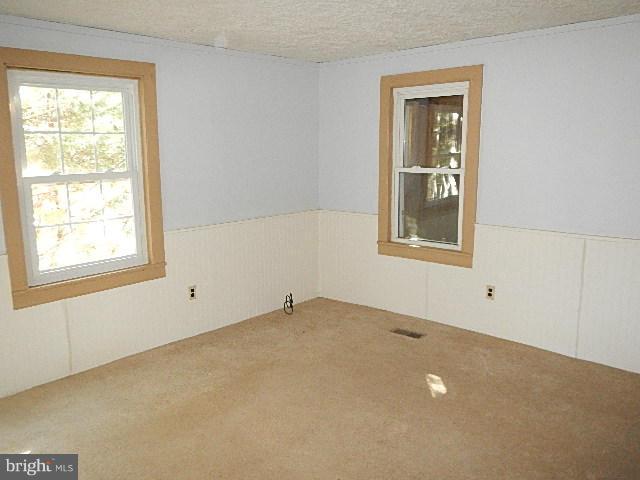 2060 Flag Marsh Road Mount Airy, MD 21771 - Photo 5 of 11 an empty room with a window