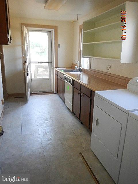 2060 Flag Marsh Road Mount Airy, MD 21771 - Photo 6 of 11 a kitchen with a sink cabinets and a window