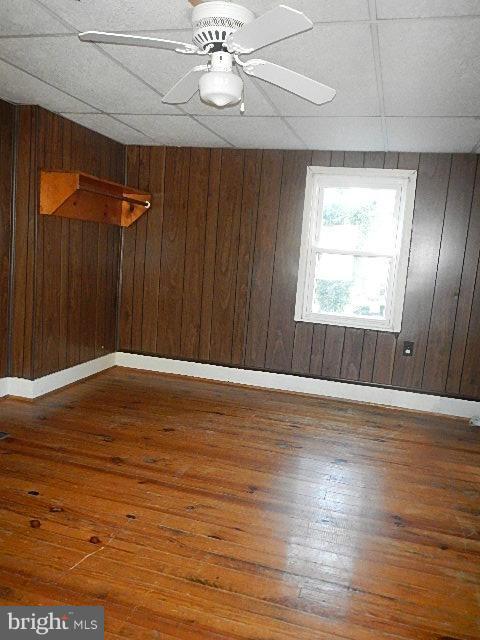 2060 Flag Marsh Road Mount Airy, MD 21771 - Photo 7 of 11 an empty room with wooden floor closet and windows