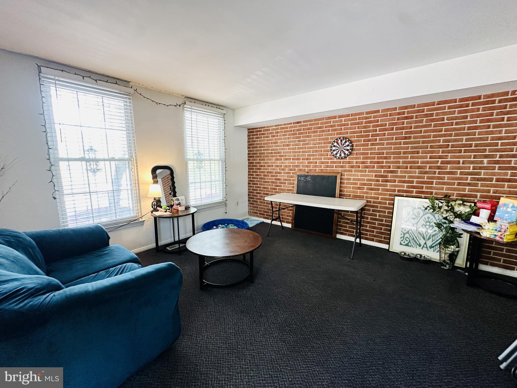 28 North Wolfe Street Baltimore, MD 21231 - Photo 7 of 25 a living room with furniture and a window