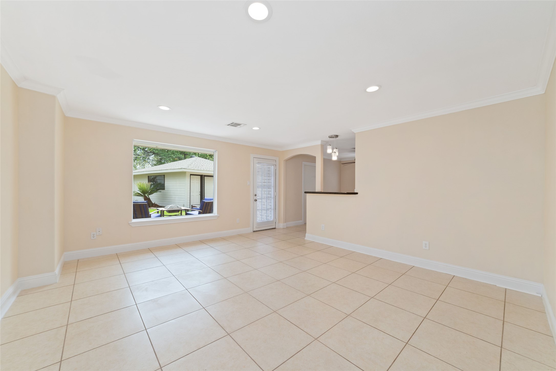 5643 Cheena Drive Houston, TX 77096 - Photo 15 of 32 an empty room with entrance and windows
