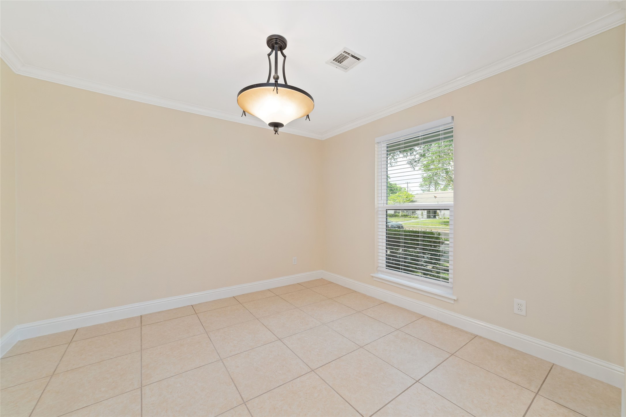 5643 Cheena Drive Houston, TX 77096 - Photo 7 of 32 a view of an empty room with a window