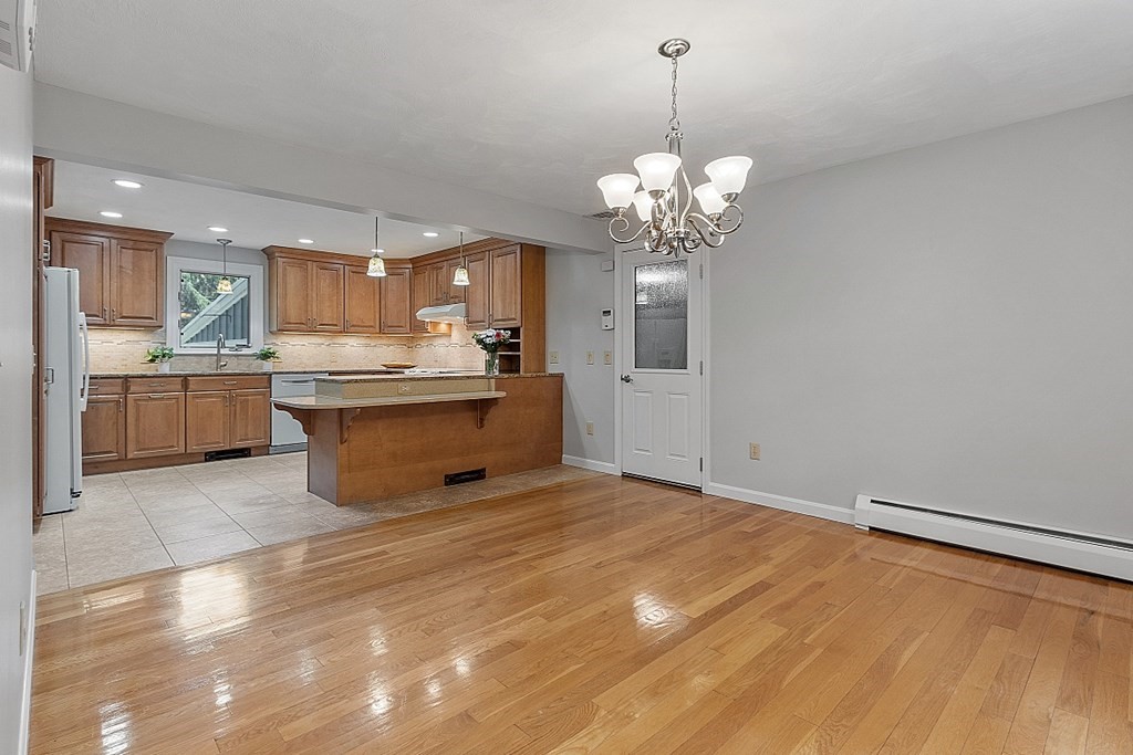 10 Hickory Drive Worcester, MA 01609 - Photo 13 of 34 a living room with stainless steel appliances granite countertop furniture and a chandelier