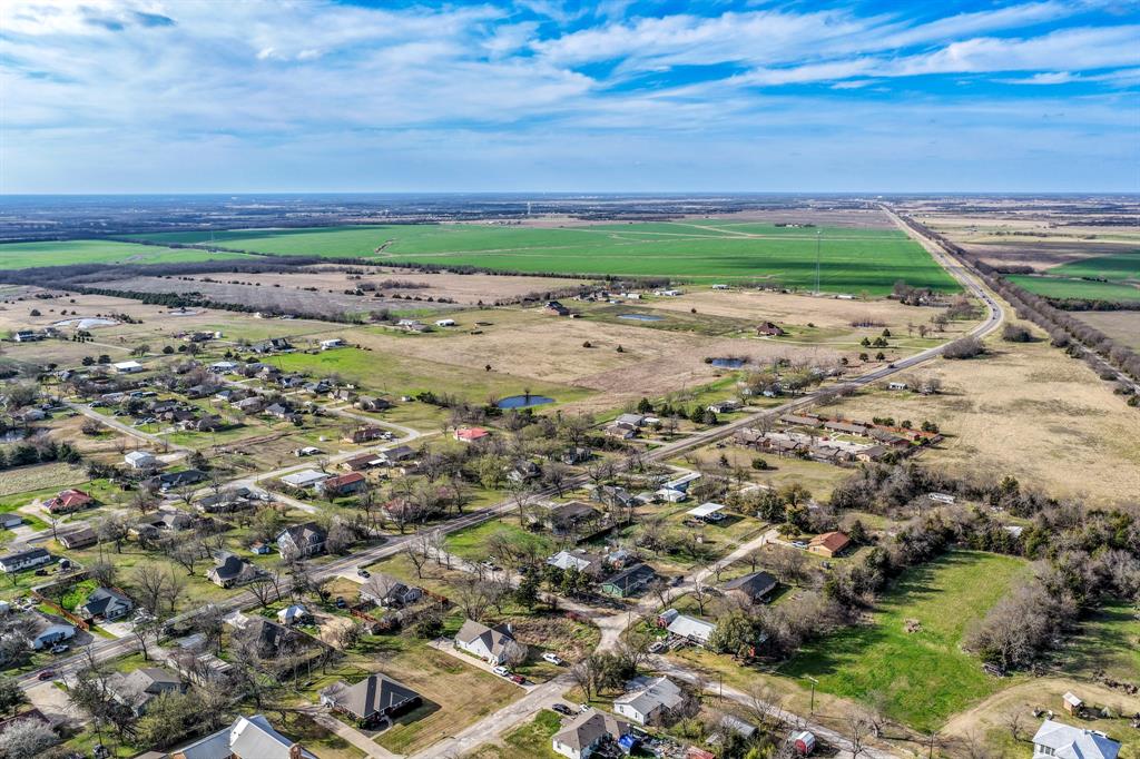 215 North 4th Street Celeste, TX 75423 - Photo 15 of 20 a view of a yard with a garden