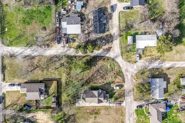 an aerial view of residential house with outdoor space