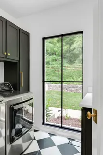 a view of backyard with outdoor seating a patio and outdoor seating