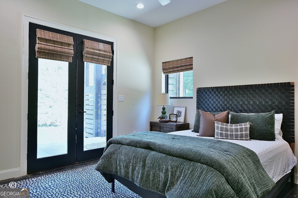 299 Coldivees Road Hamilton, GA 31811 - Photo 25 of 46 a bedroom with a large bed and a window