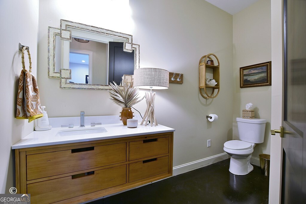 299 Coldivees Road Hamilton, GA 31811 - Photo 28 of 46 a bathroom with a sink and a mirror