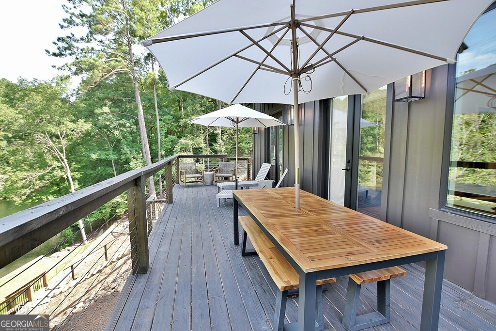 299 Coldivees Road Hamilton, GA 31811 - Photo 35 of 46 a view of balcony with furniture and wooden deck