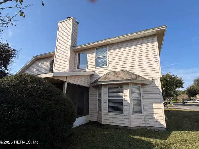 a front view of a house with a porch