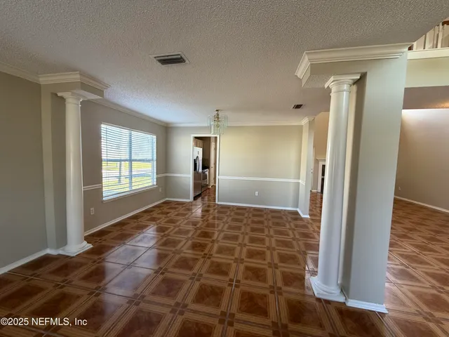a bathroom with a glass door shower