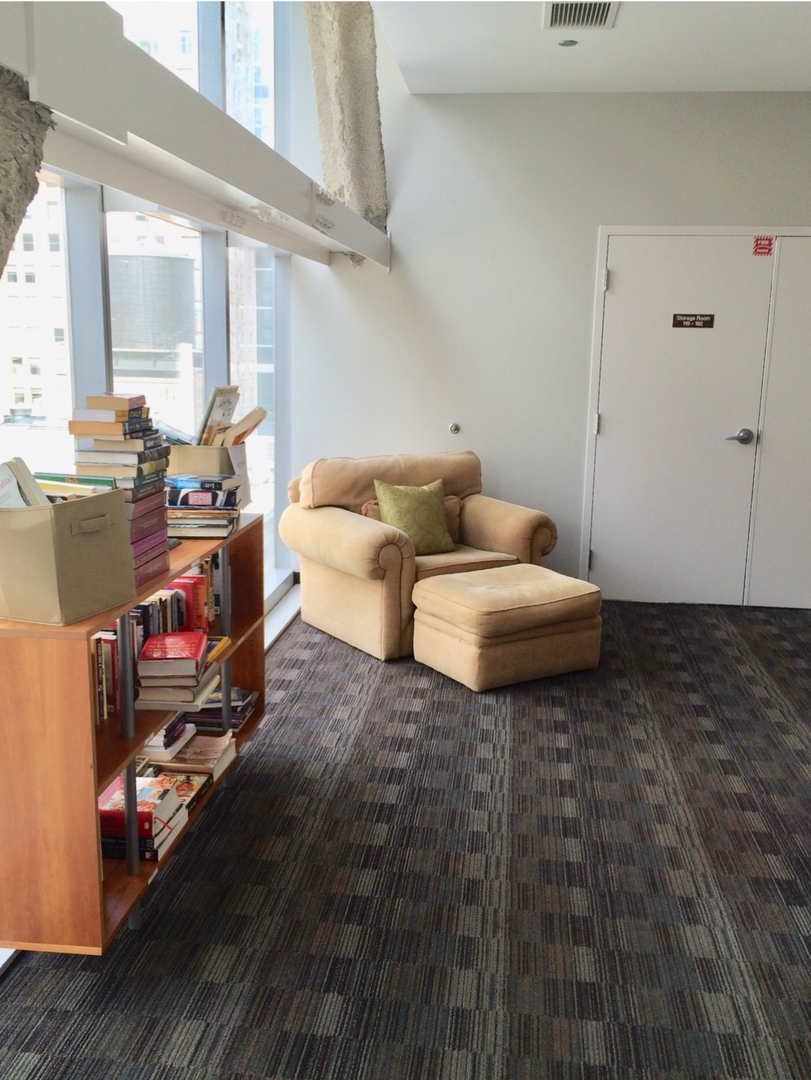 8 East Randolph Street, Unit 1002 Chicago, IL 60601 - Photo 18 of 23 a living room with furniture and a wooden floor