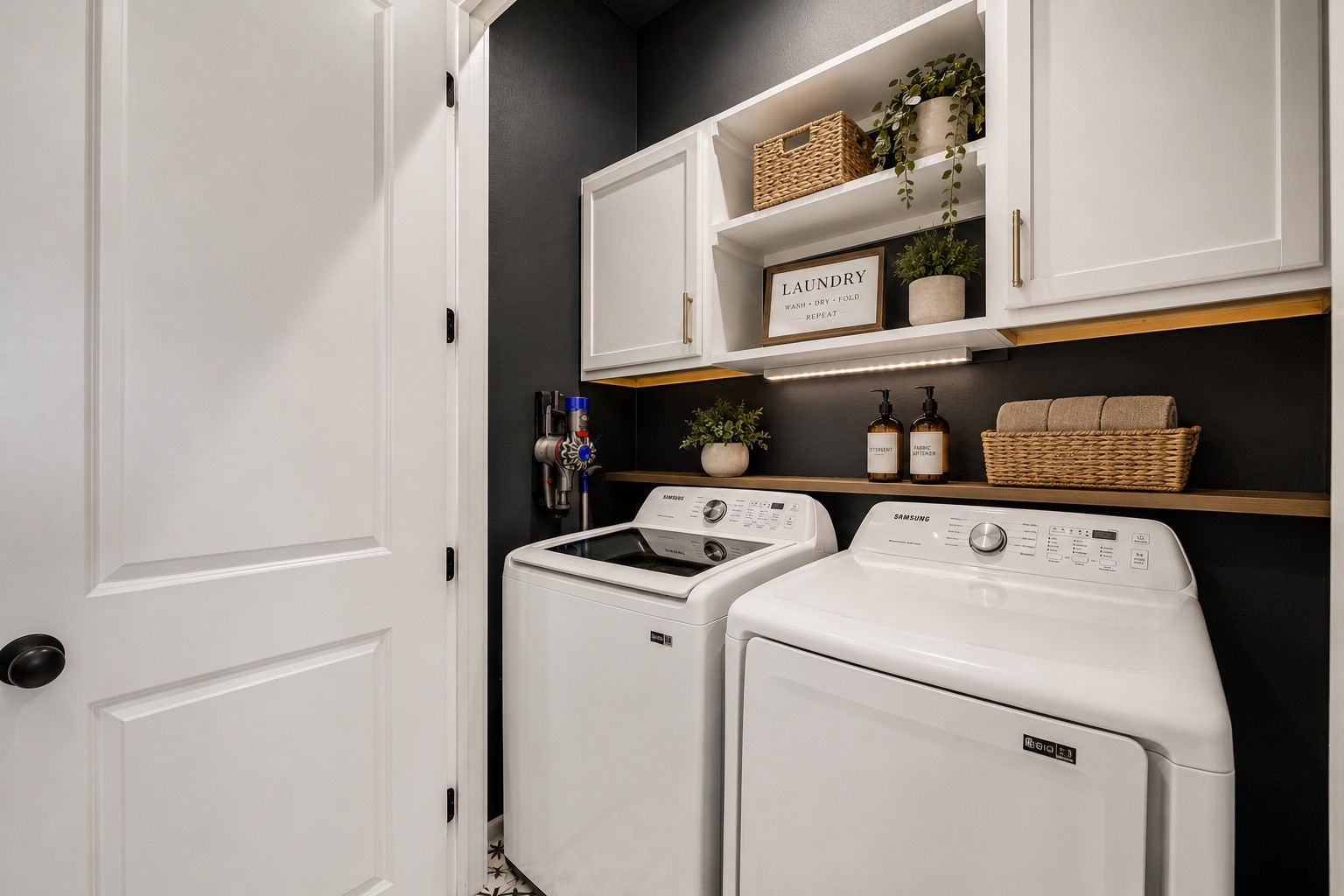 1508 Ryon Street, Unit B Houston, TX 77009 - Photo 10 of 32 Laundry room conveniently located next to the primary with custom shelves for storage.