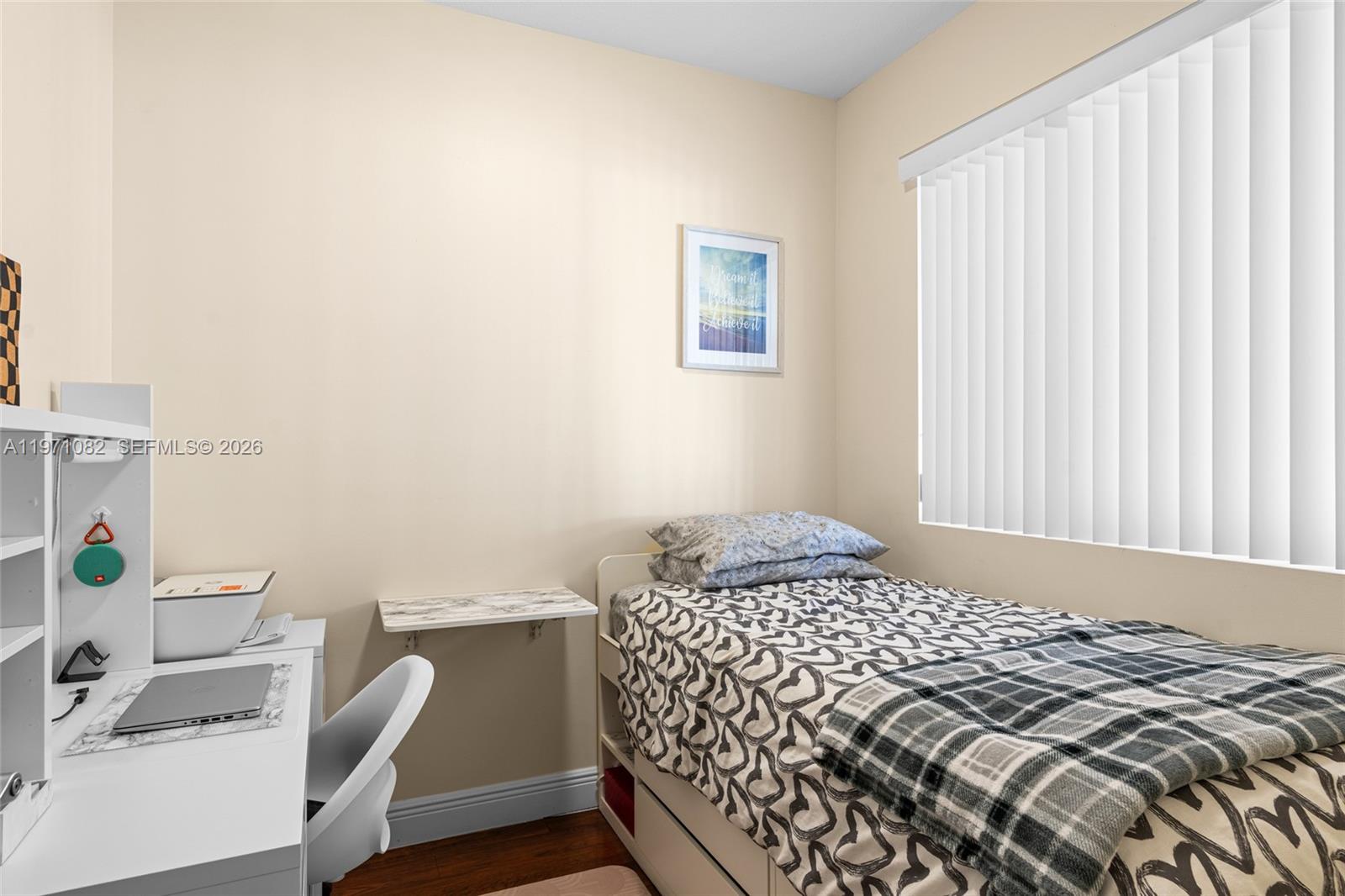 7275 Southwest 90th Way, Unit 404 Miami, FL 33156 - Photo 15 of 35 a bedroom with a bed and a window