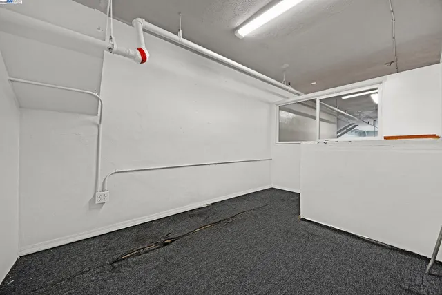 a view of a room with an empty space