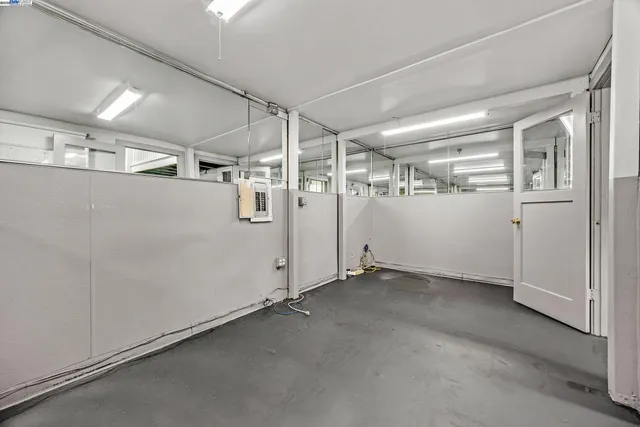 a view of a livingroom with stairs and couch