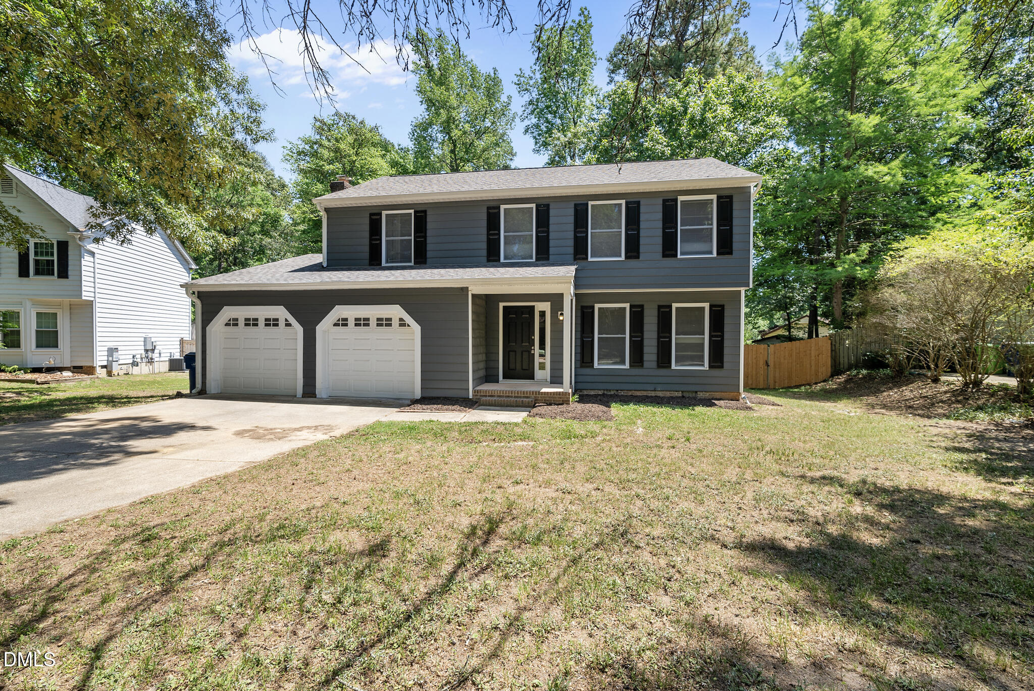 2108 Treverton Place Raleigh, NC 27609 - Photo 2 of 30 a front view of a house with a yard