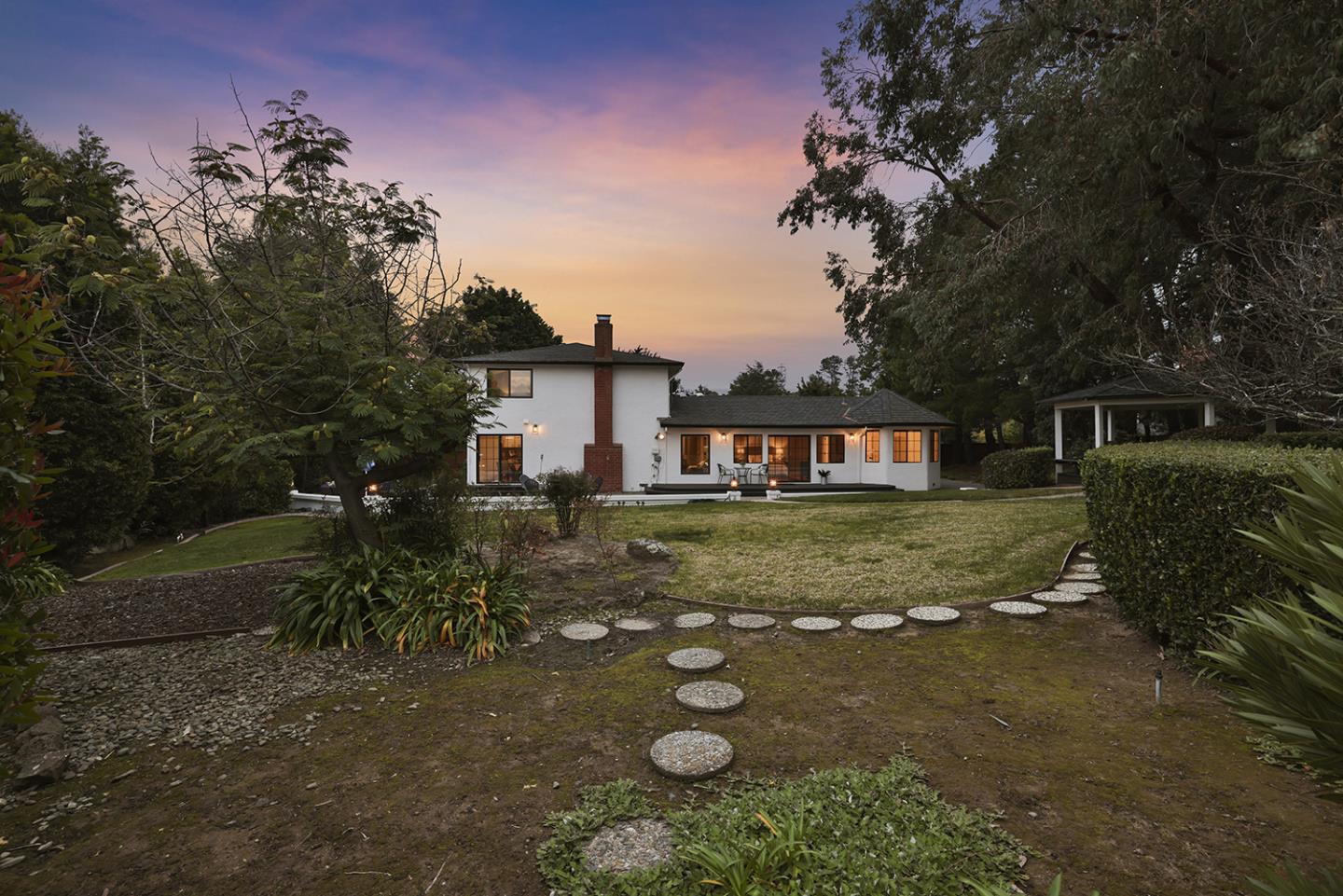20 Tea Tree Court Hillsborough, CA 94010 - Photo 16 of 100 a front view of a house with a yard