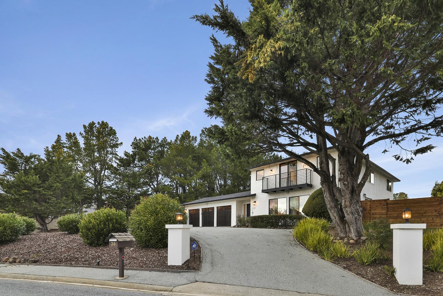 20 Tea Tree Court Hillsborough, CA 94010 - Photo 23 of 100 a front view of a house with a tree