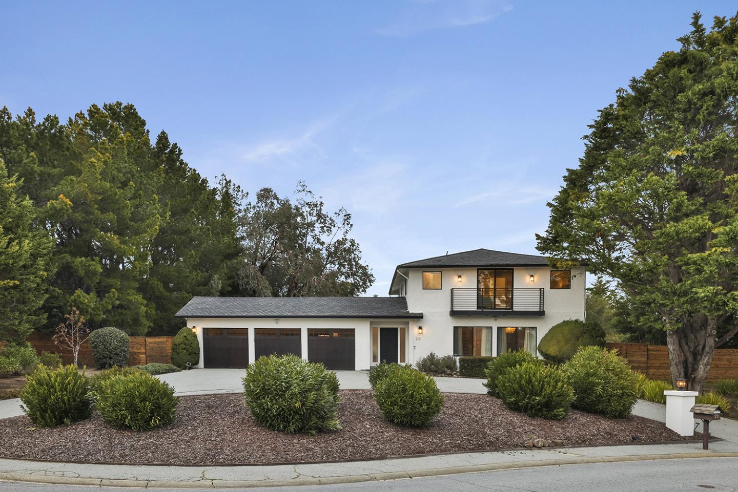20 Tea Tree Court Hillsborough, CA 94010 - Photo 25 of 100 a front view of a house with a garden