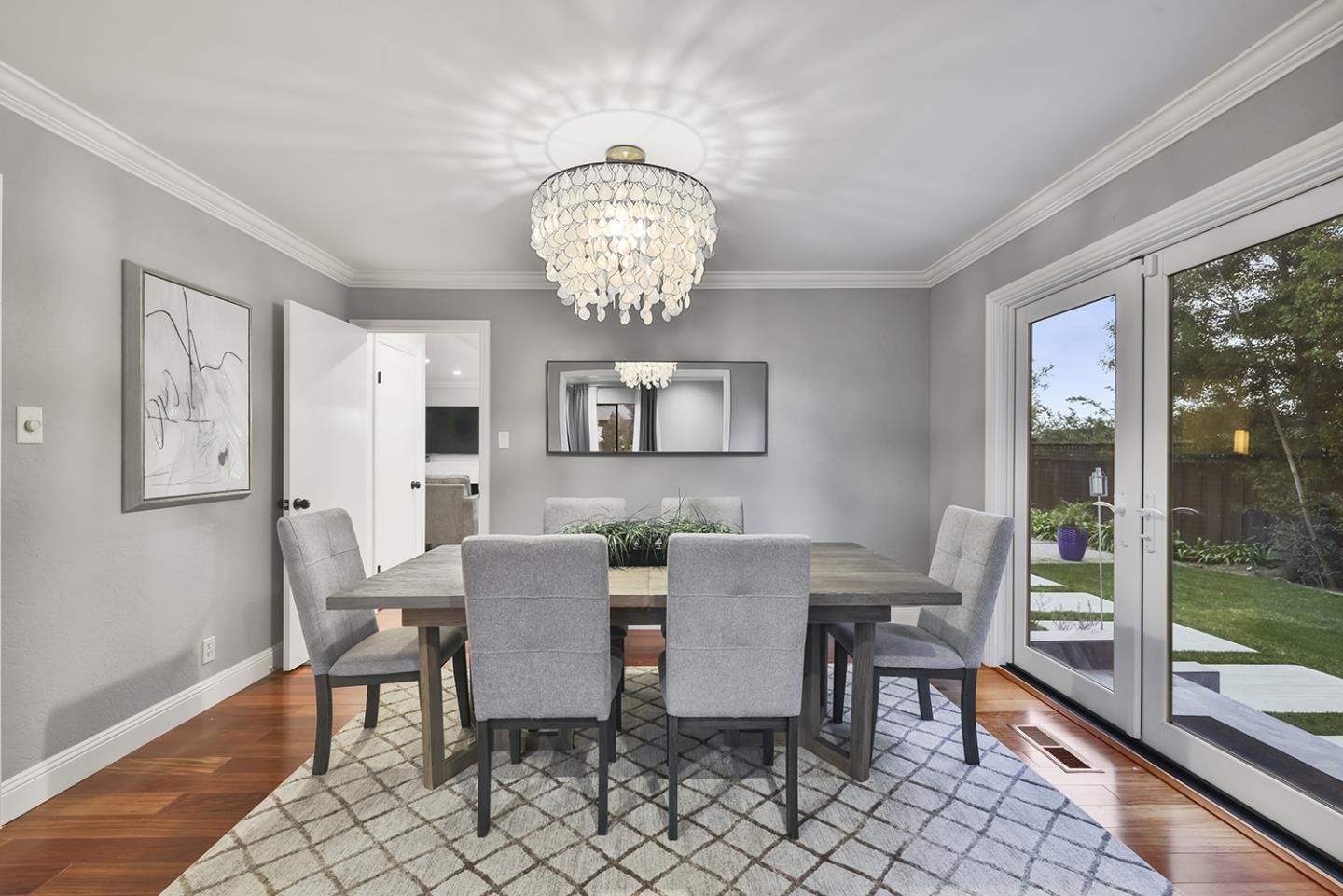 20 Tea Tree Court Hillsborough, CA 94010 - Photo 45 of 100 a view of a dining room with furniture wooden floor and chandelier