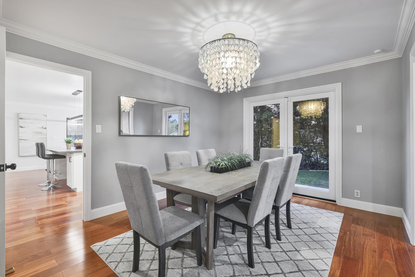 20 Tea Tree Court Hillsborough, CA 94010 - Photo 46 of 100 a view of a dining room with furniture wooden floor and a chandelier