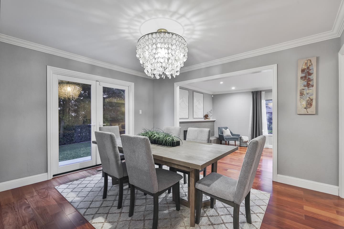 20 Tea Tree Court Hillsborough, CA 94010 - Photo 47 of 100 a view of a dining room with furniture wooden floor and chandelier